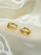 Ovale Huggie Hoops Ohrringe Gold Silber