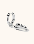Wavy Huggie Hoop Ohrringe Gold Silber