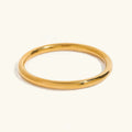 Zephyrine Smooth Gold Bangle